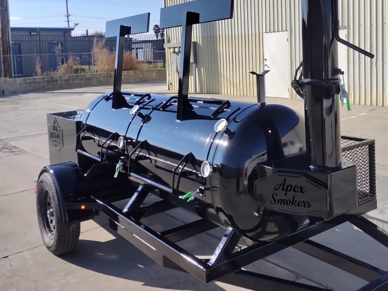 Apex Magnus 250-gallon offset smoker on a trailer